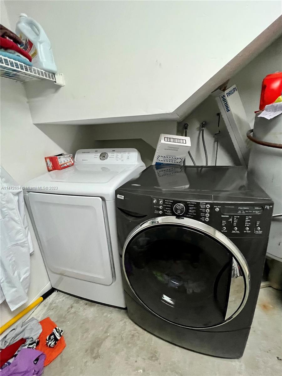West End Miami, FL 33185 - Photo 27 of 30 a utility room with dryer and washer