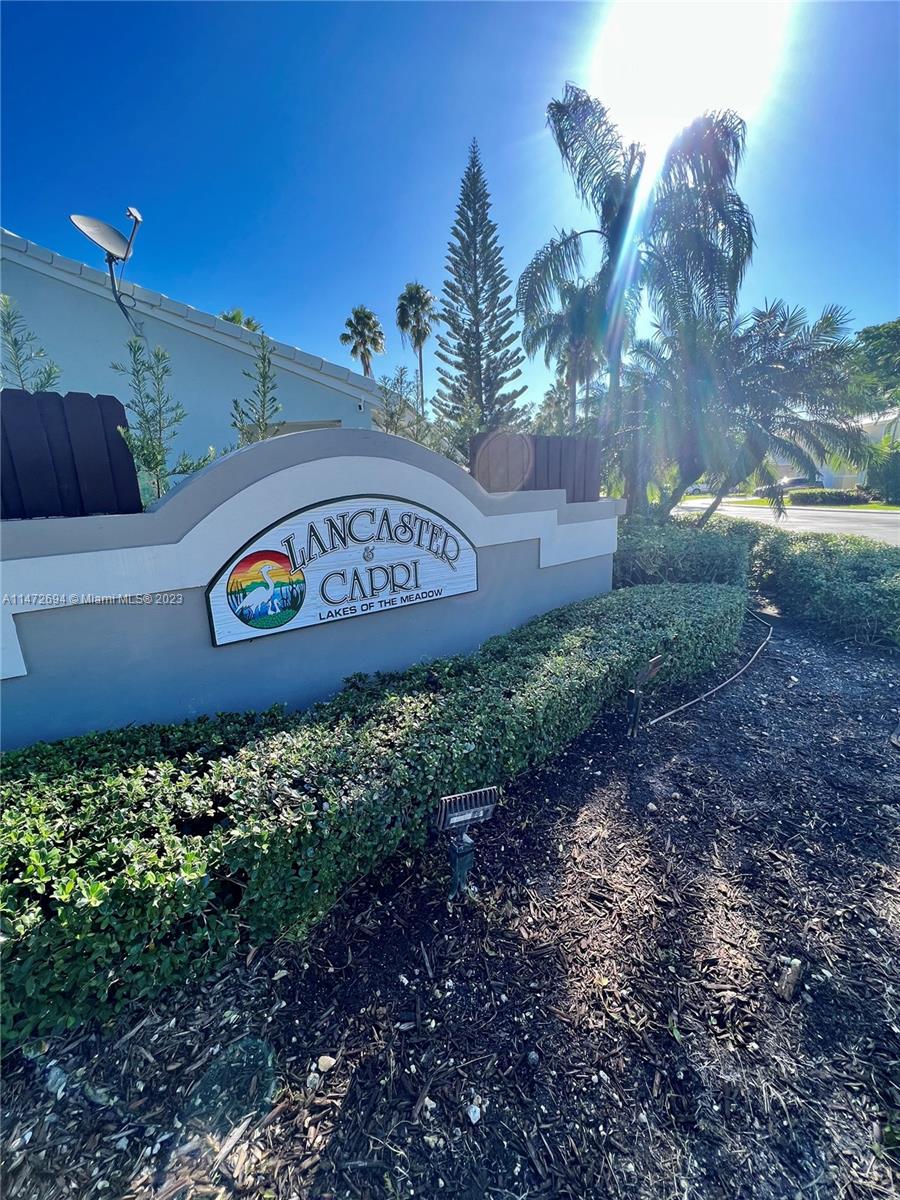 West End Miami, FL 33185 - Photo 30 of 30 a sign that is sitting on a brick wall