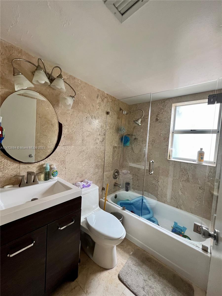 West End Miami, FL 33185 - Photo 6 of 30 a bathroom with a sink toilet and shower