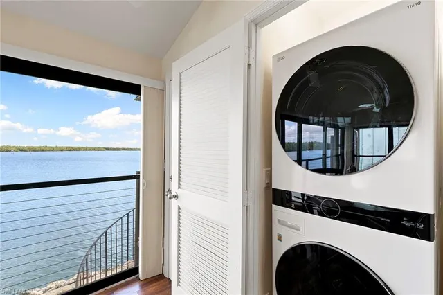 a view of a swimming pool with a lounge chairs
