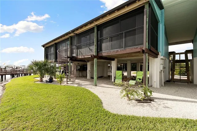 a view of a balcony with chairs
