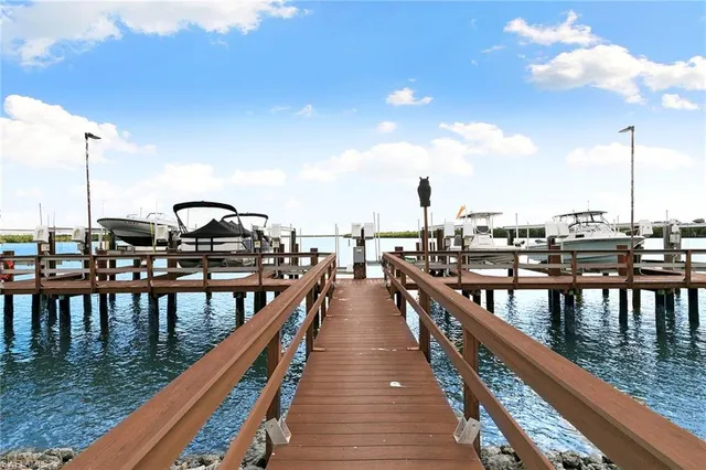 a view of a balcony with chairs