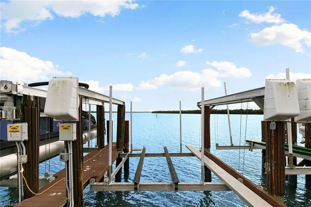 a view of a swimming pool with a deck