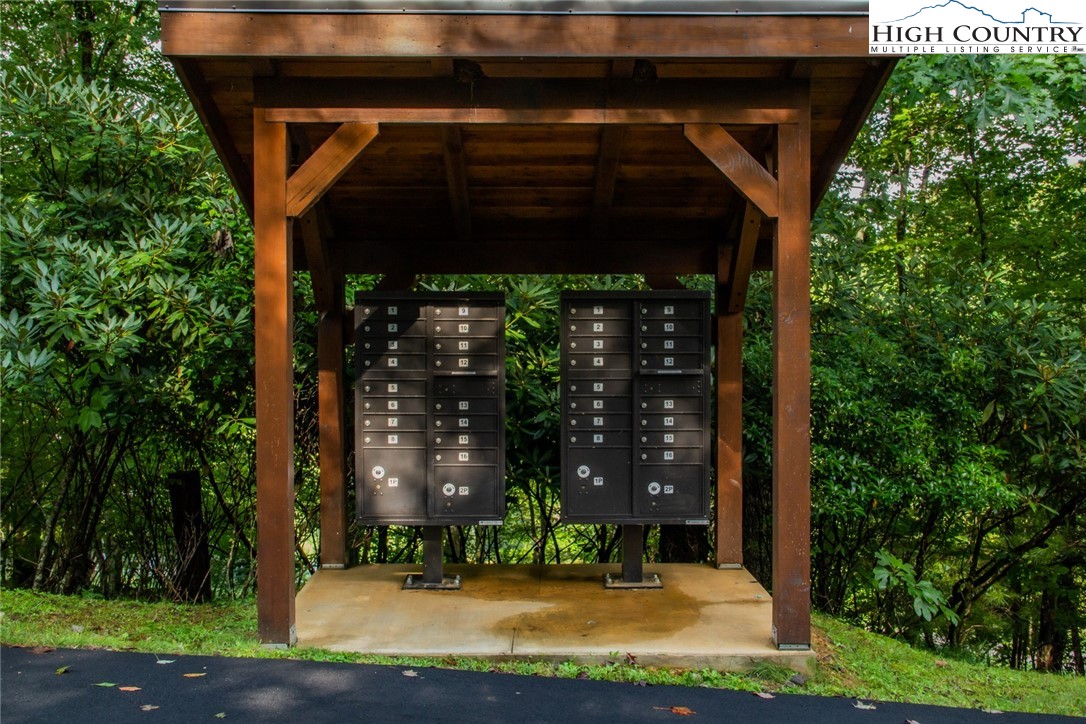 8 Woodland Ridge Lansing, NC 28643 - Photo 13 of 14 a view of a wooden door of the house