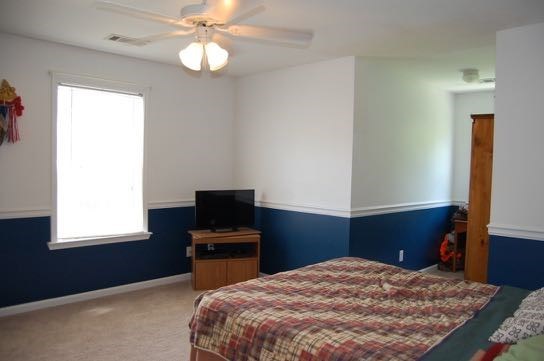 100 Lower Simmons Road Macon, GA 31220 - Photo 20 of 34 a bedroom with a bed and a window