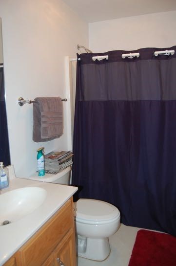 100 Lower Simmons Road Macon, GA 31220 - Photo 22 of 34 a bathroom with a sink a toilet and mirror