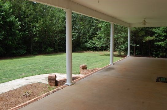 100 Lower Simmons Road Macon, GA 31220 - Photo 26 of 34 a view of a two room with a floor to ceiling window and a small yard