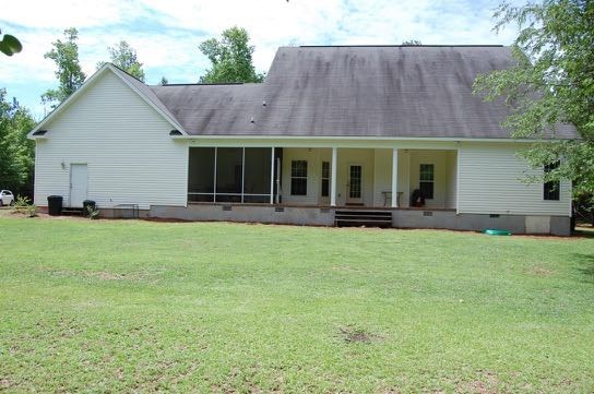 100 Lower Simmons Road Macon, GA 31220 - Photo 32 of 34 a front view of house with yard and outdoor seating