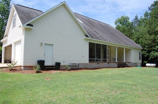 100 Lower Simmons Road Macon, GA 31220 - Photo 33 of 34 a view of a house with a backyard
