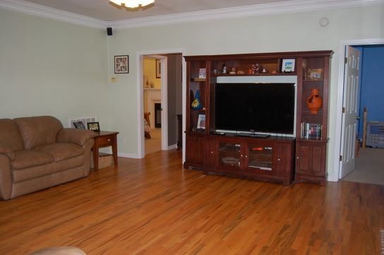 100 Lower Simmons Road Macon, GA 31220 - Photo 6 of 34 a living room with furniture and a flat screen tv