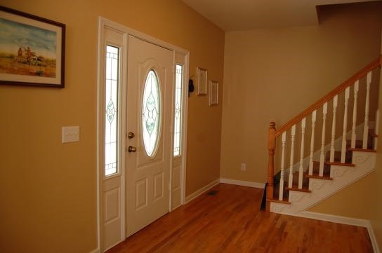100 Lower Simmons Road Macon, GA 31220 - Photo 9 of 34 a view of a hallway with wooden floor and staircase