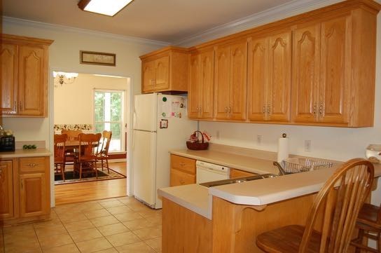 100 Lower Simmons Road Macon, GA 31220 - Photo 10 of 34 a kitchen with stainless steel appliances a refrigerator and a sink