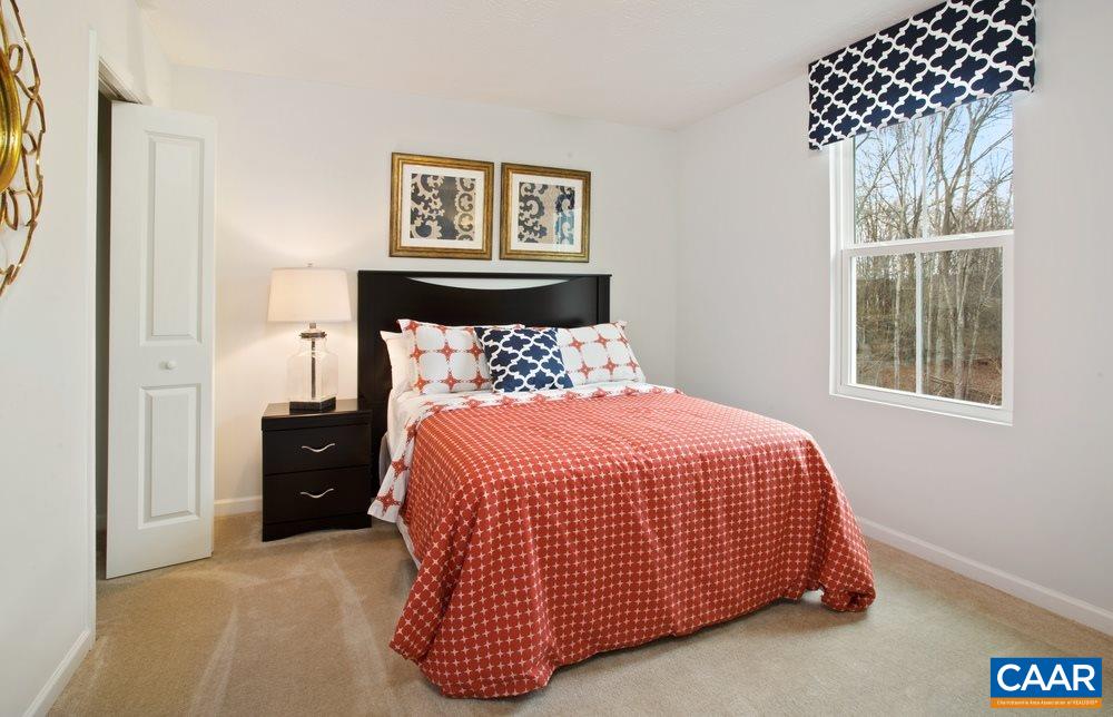 96 Oland Street Ruckersville, VA 22968 - Photo 11 of 18 a bedroom with a bed and window