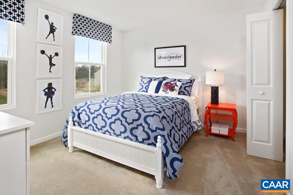 96 Oland Street Ruckersville, VA 22968 - Photo 10 of 18 a bedroom with a bed and window