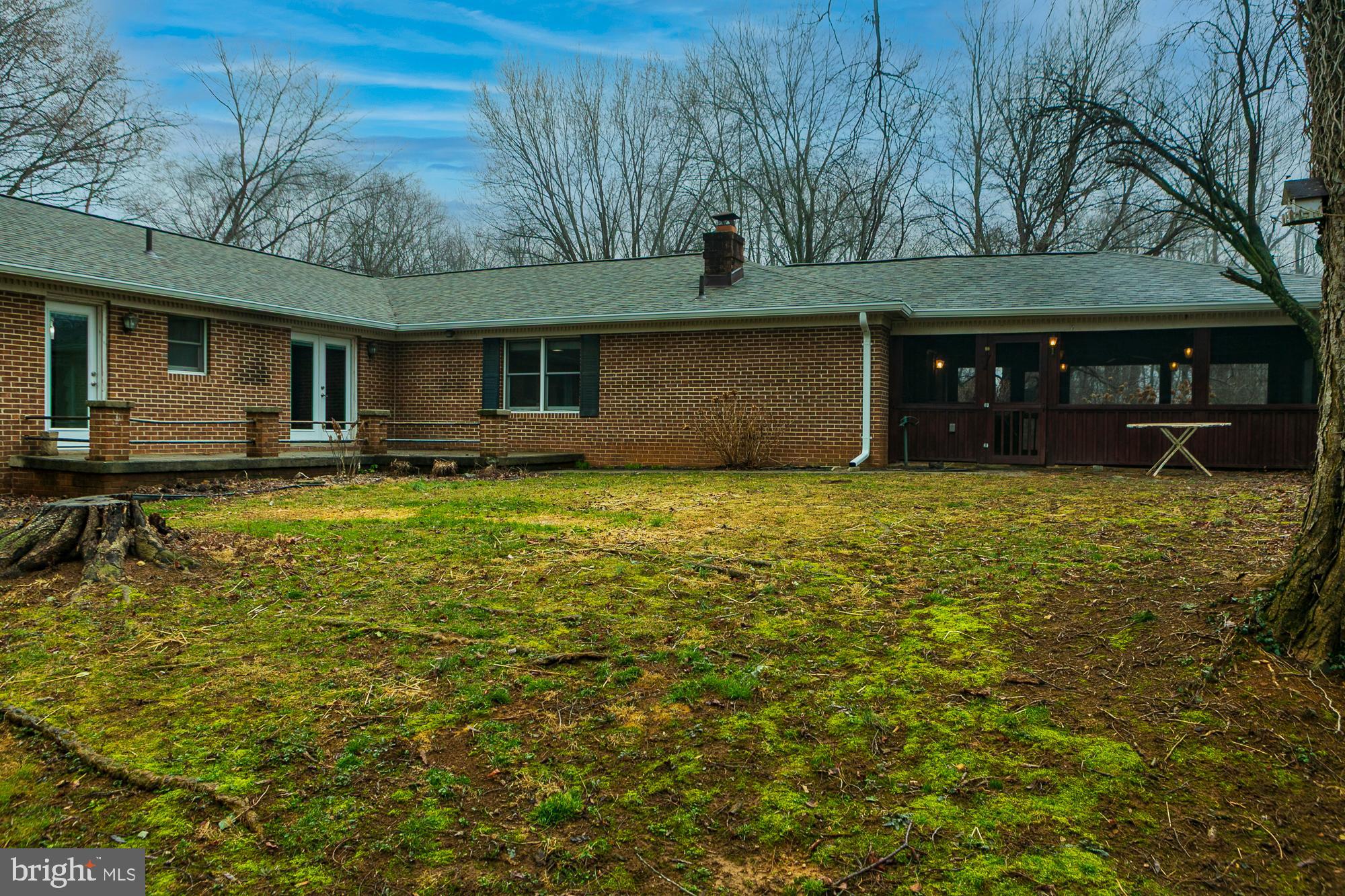 35 Grant Road Kearneysville, WV 25430 - Photo 101 of 122 a front view of house with yard and trees in the background