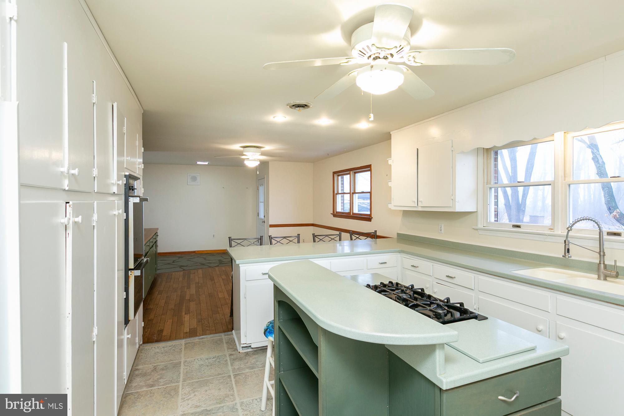 35 Grant Road Kearneysville, WV 25430 - Photo 120 of 122 a kitchen with a sink a stove a refrigerator and a refrigerator