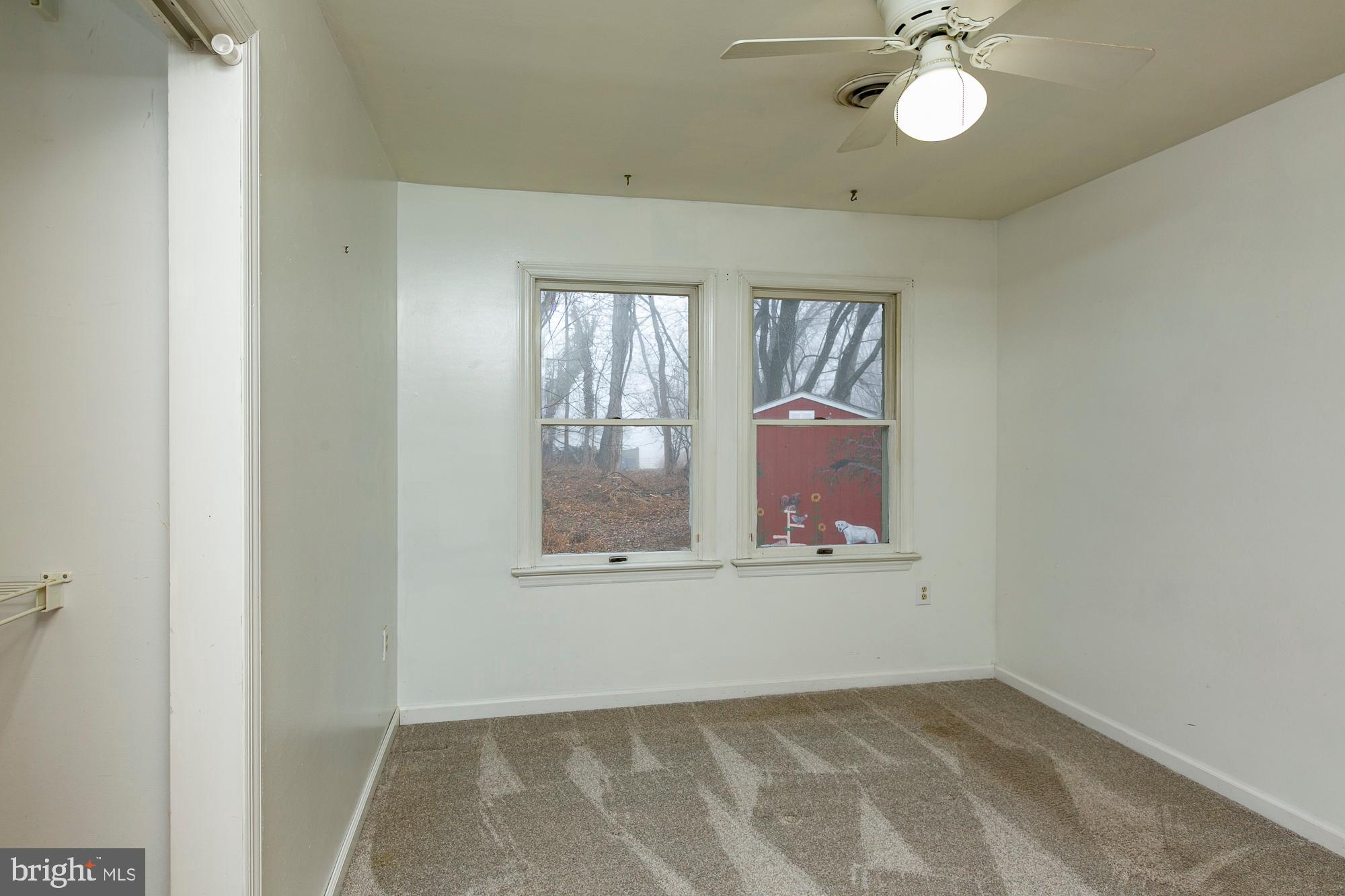 35 Grant Road Kearneysville, WV 25430 - Photo 30 of 122 an empty room with windows and fan