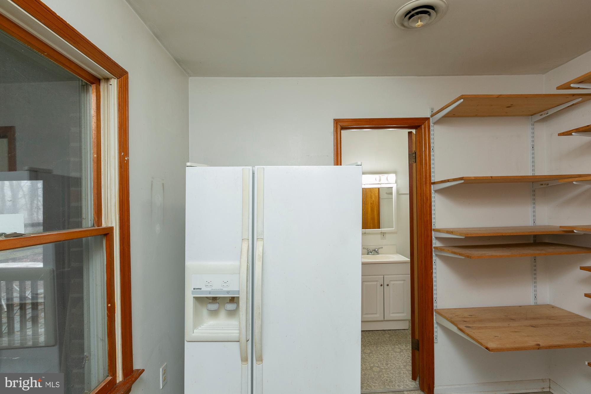 35 Grant Road Kearneysville, WV 25430 - Photo 3 of 122 a white refrigerator freezer and a stove sitting inside of a kitchen