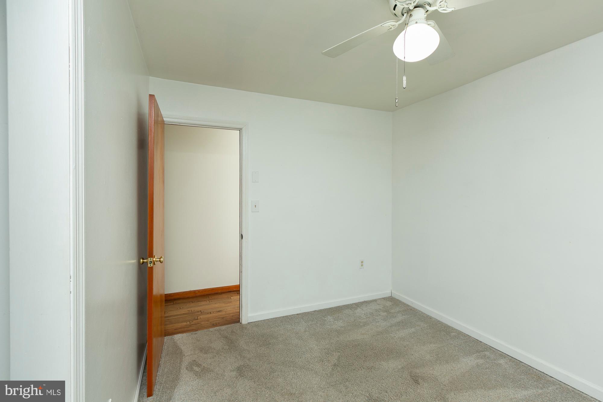 35 Grant Road Kearneysville, WV 25430 - Photo 46 of 122 an empty room with a chandelier fan
