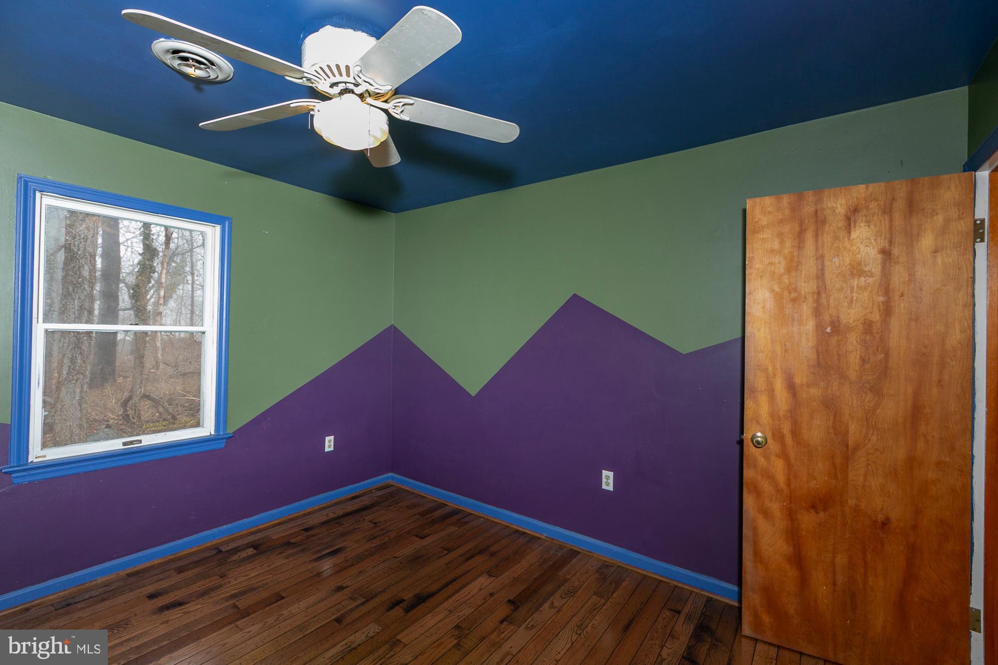 35 Grant Road Kearneysville, WV 25430 - Photo 51 of 122 a view of a room with a ceiling fan and a window