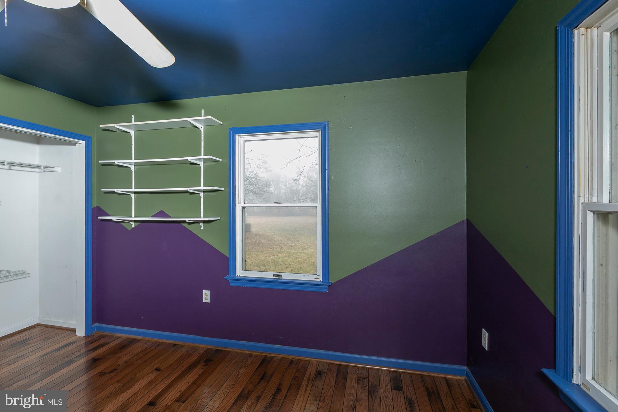 35 Grant Road Kearneysville, WV 25430 - Photo 52 of 122 a view of a room with wooden floor and windows