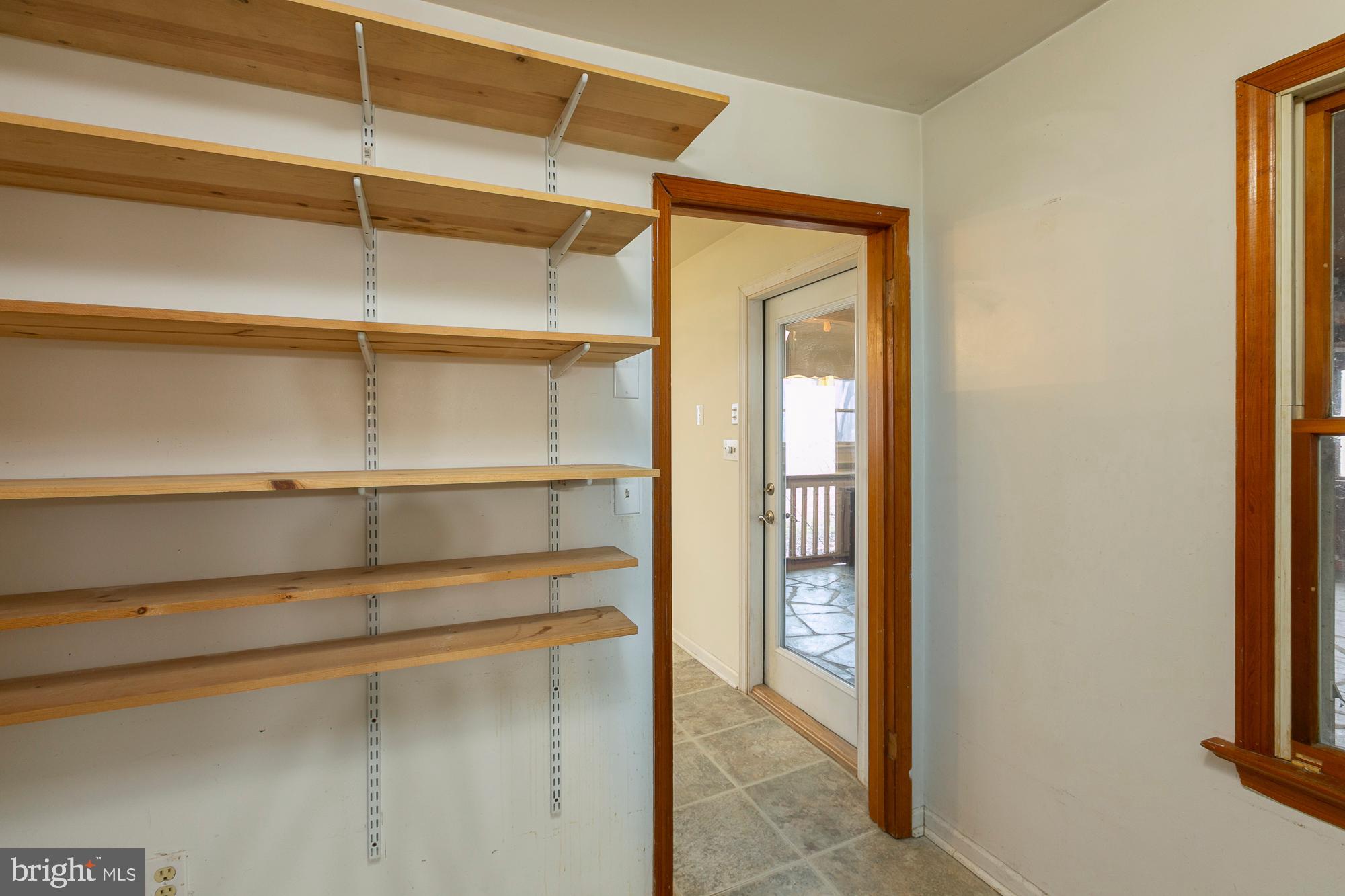 35 Grant Road Kearneysville, WV 25430 - Photo 8 of 122 a view of walk in closet with empty racks