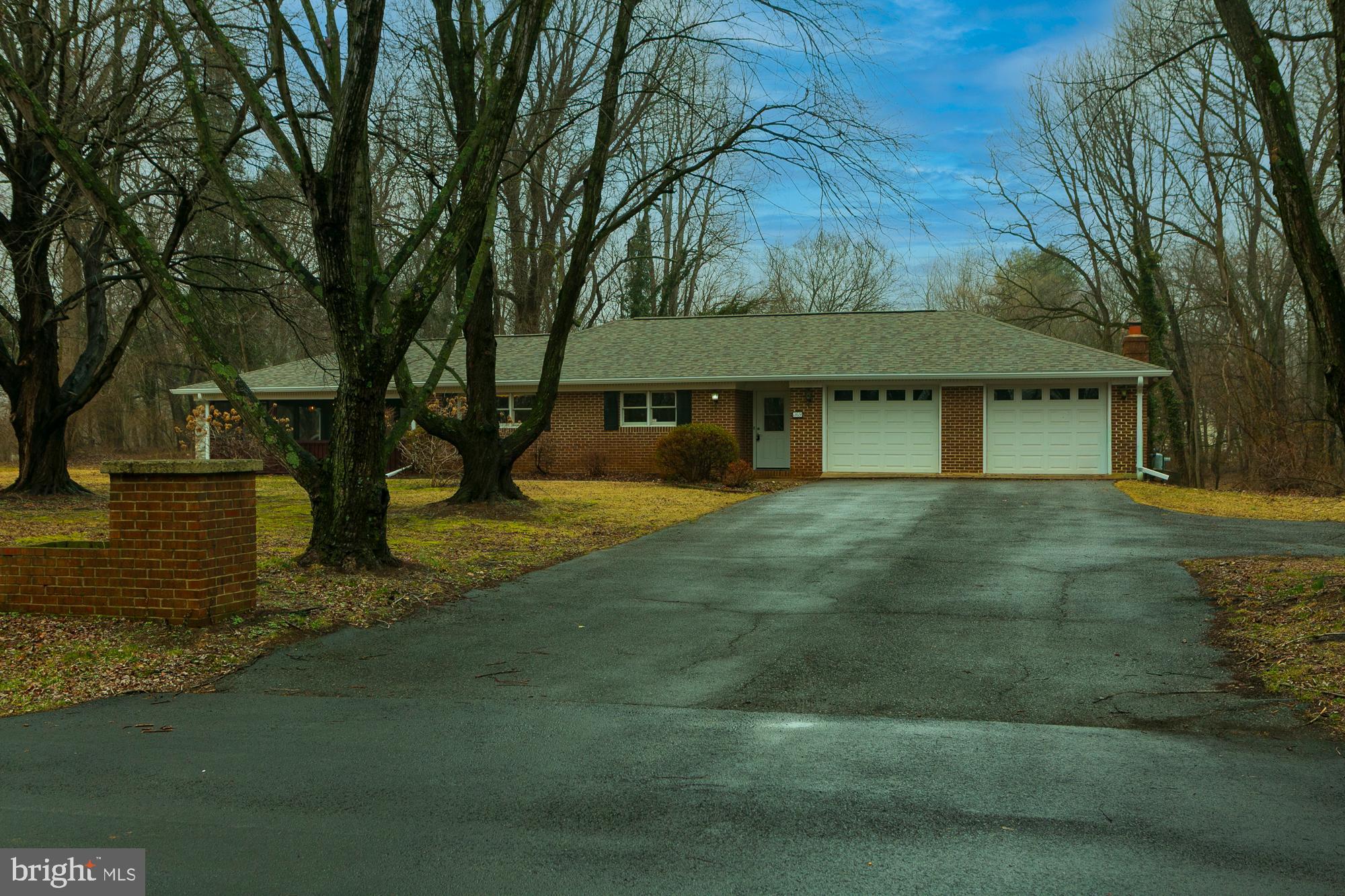 35 Grant Road Kearneysville, WV 25430 - Photo 86 of 122 a front view of a house with garden