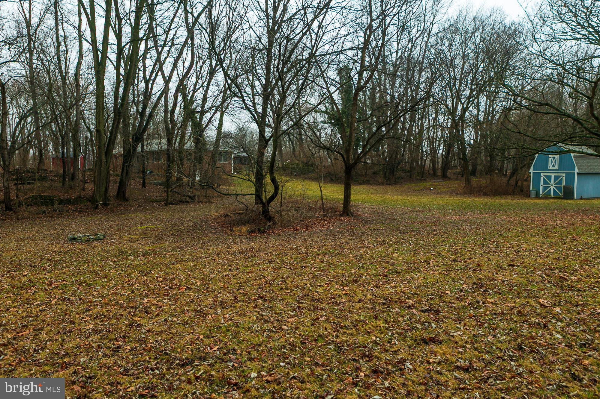 35 Grant Road Kearneysville, WV 25430 - Photo 97 of 122 a backyard of a house with lots of green space