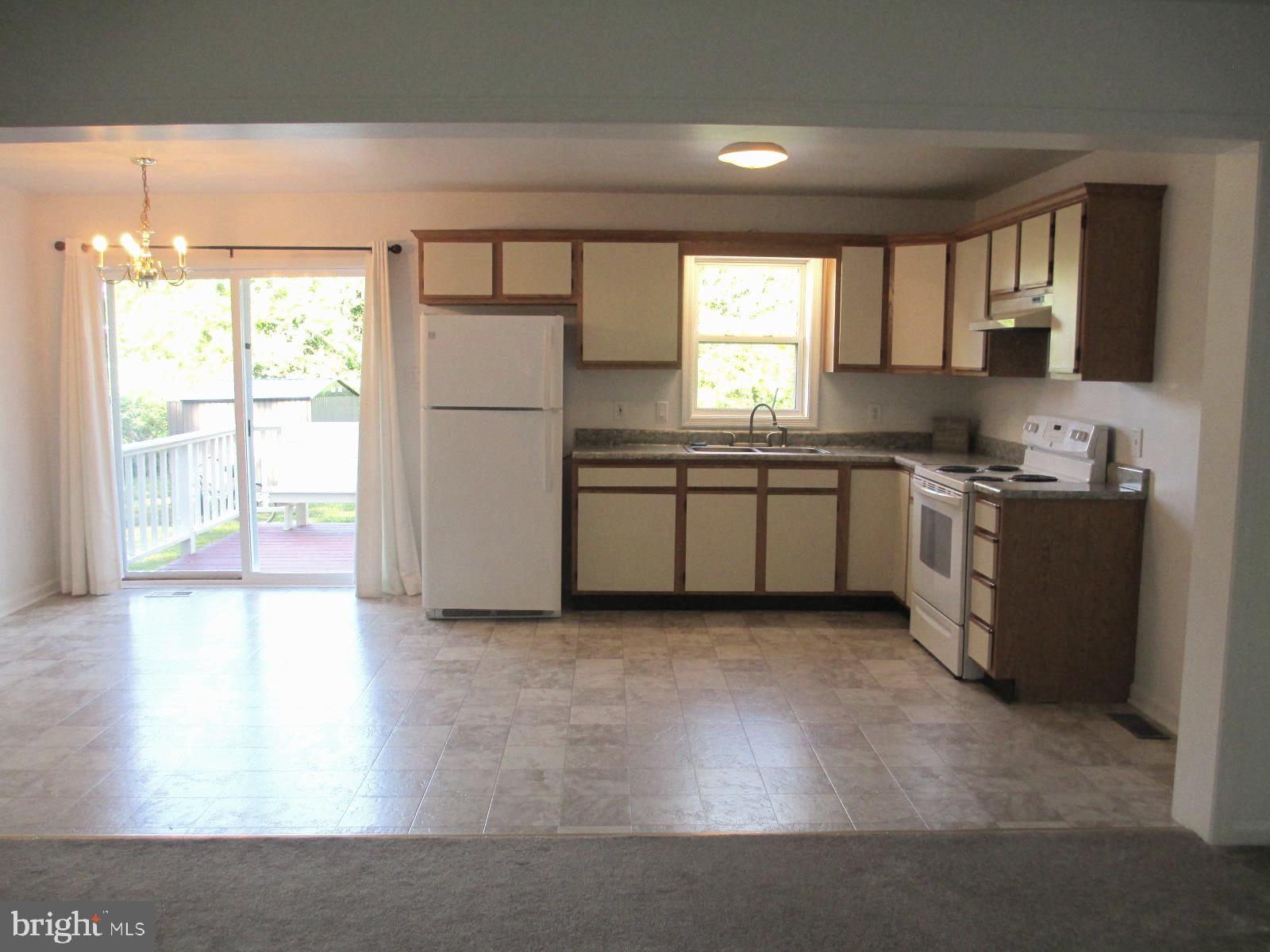8732 Elm Road Chestertown, MD 21620 - Photo 3 of 18 Kitchen with sliding doors to the deck