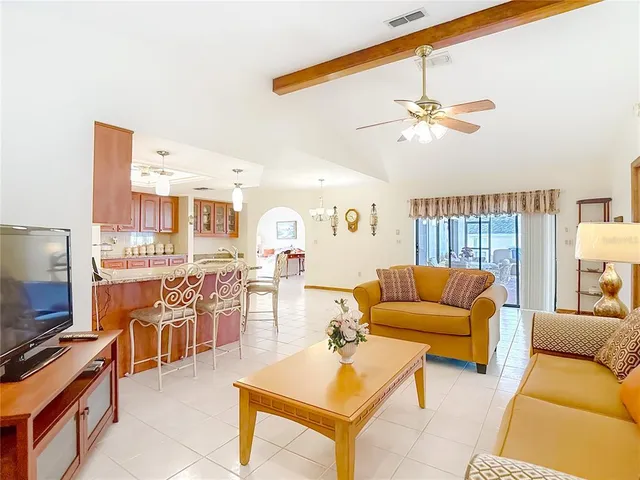 a kitchen with stainless steel appliances granite countertop a refrigerator sink and cabinets