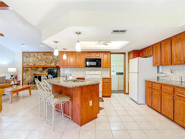 a bedroom with a bed and a chair