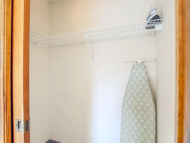 a bathroom with a sink double vanity and a mirror