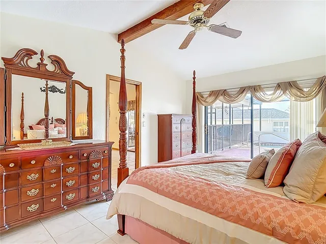 a view of a swimming pool with a yard