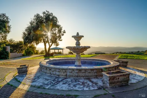 a view of a water with a fire pit