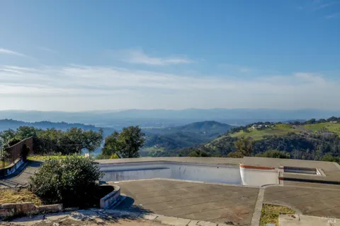 an aerial view of residential house with outdoor space