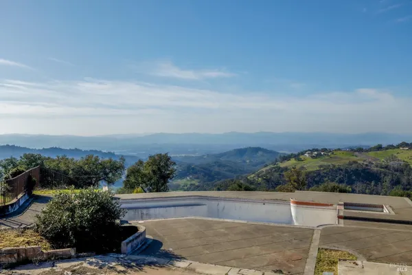 an aerial view of residential house with outdoor space