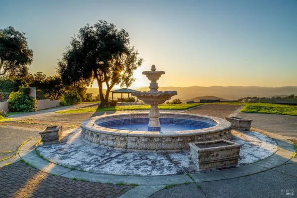 a view of a lake with a yard