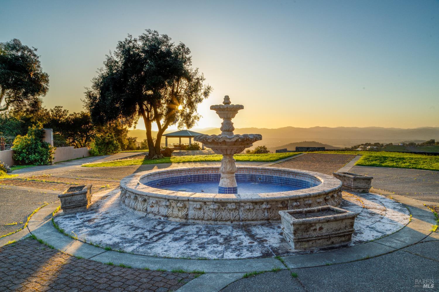 1980 Redwood Hill Court Santa Rosa, CA 95404 - Photo 43 of 49 a view of a water fountain in front of a house