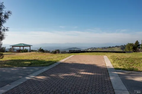 a view of a swimming pool with an ocean view