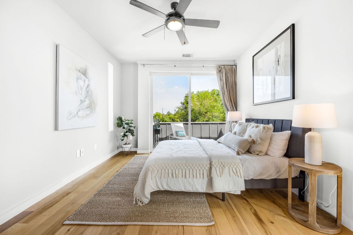 2203 East 51st Street, Unit A Austin, TX 78723 - Photo 16 of 25 a bedroom with a bed and window