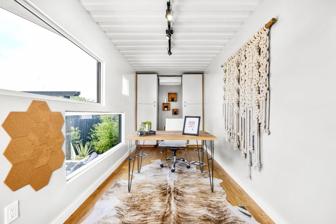 2203 East 51st Street, Unit A Austin, TX 78723 - Photo 22 of 25 a living room with furniture and a large window