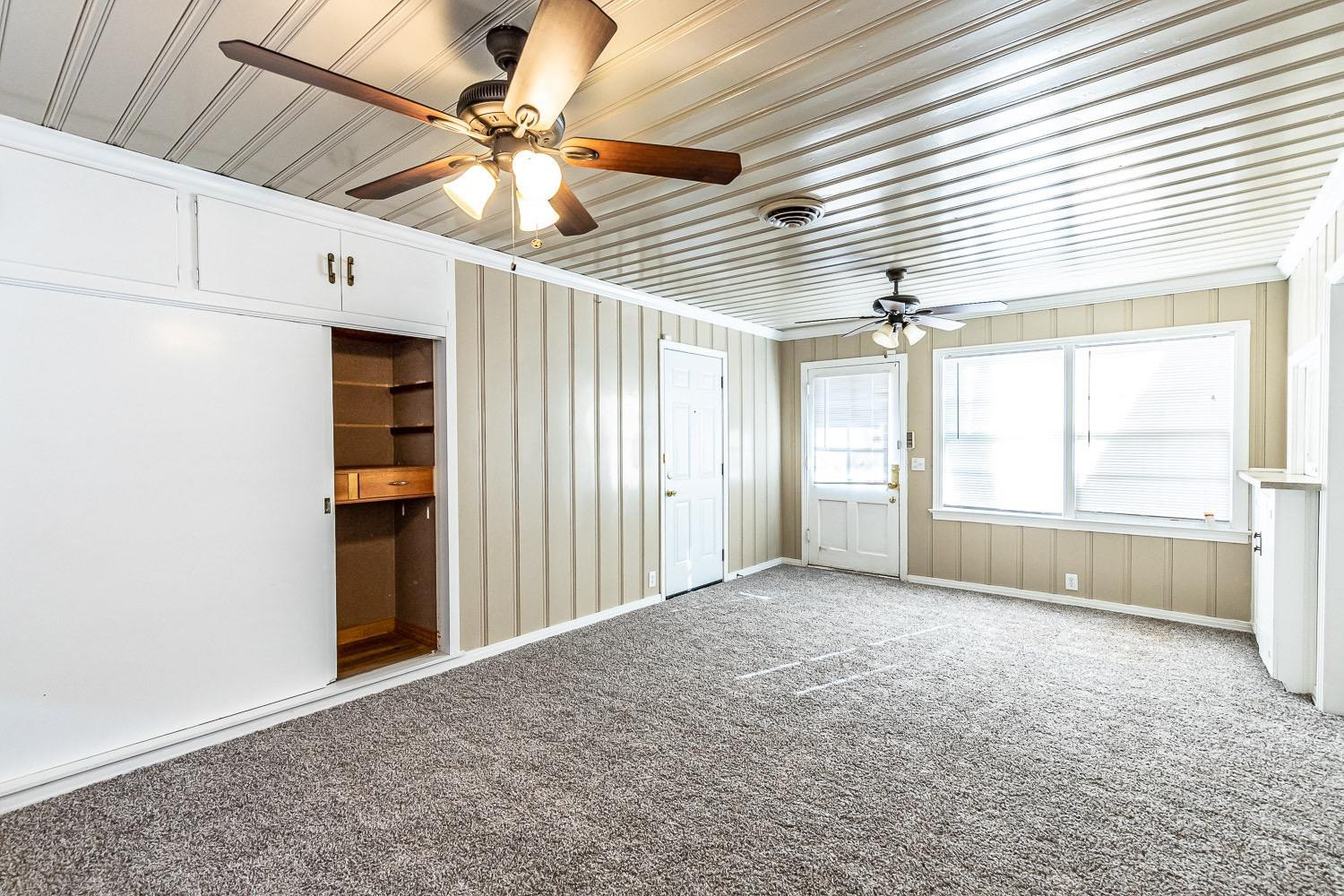 3708 27th Street Lubbock, TX 79410 - Photo 11 of 23 a view of an empty room with a window