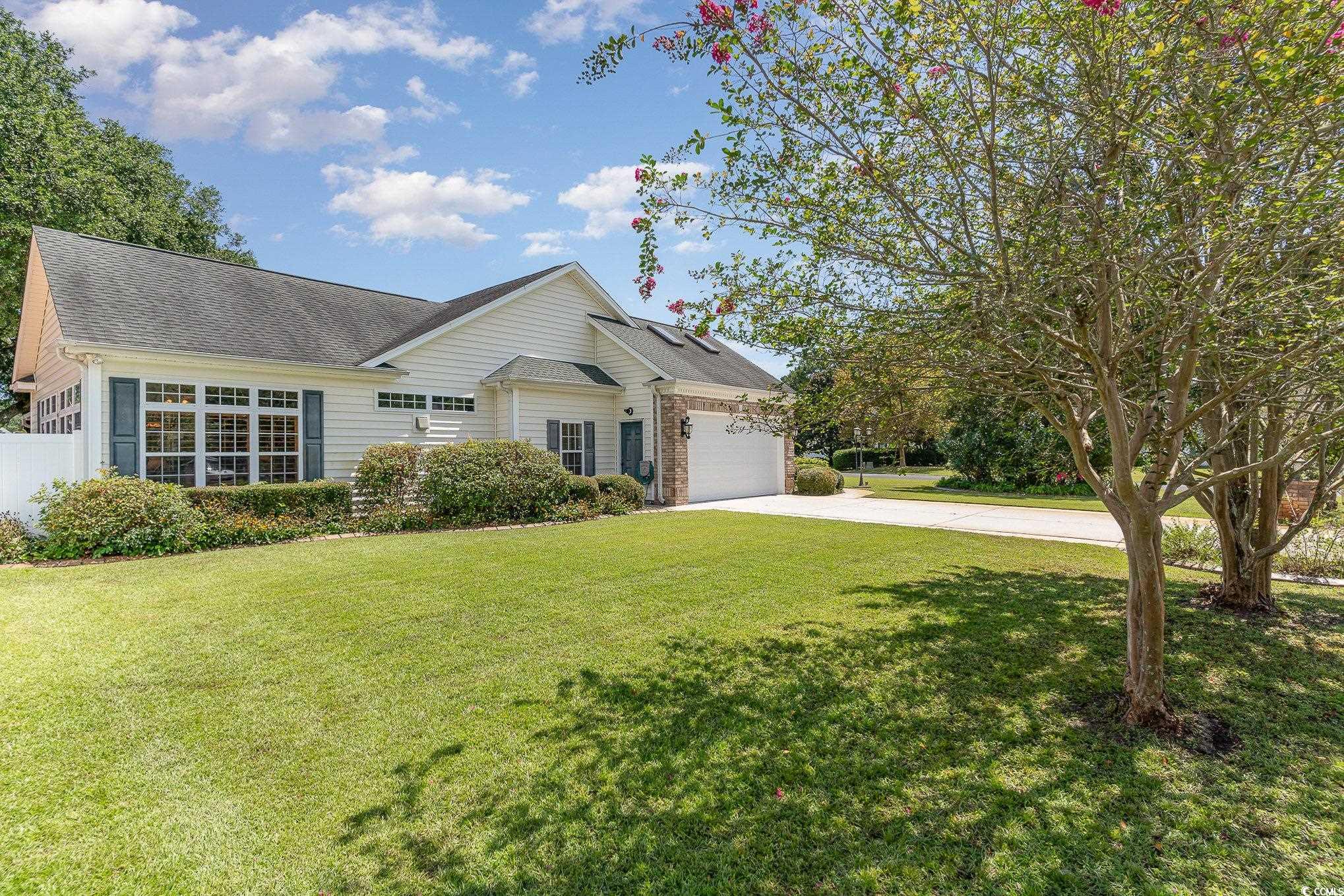 4003 Bayfield Loop Murrells Inlet, SC 29576 - Photo 21 of 40 Ranch-style home with a garage and a front yard