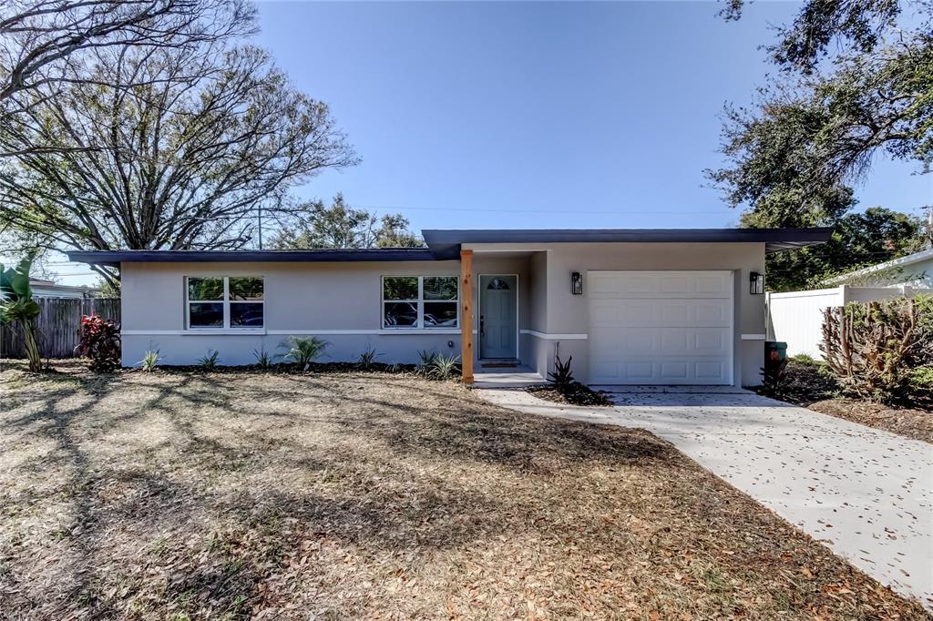 509 11th Street Northwest Largo, FL 33770 - Photo 2 of 36 a view of front of house with a yard
