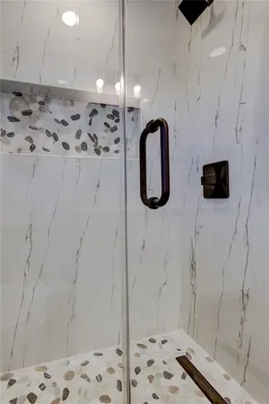 a bathroom with a sink a mirror and a toilet