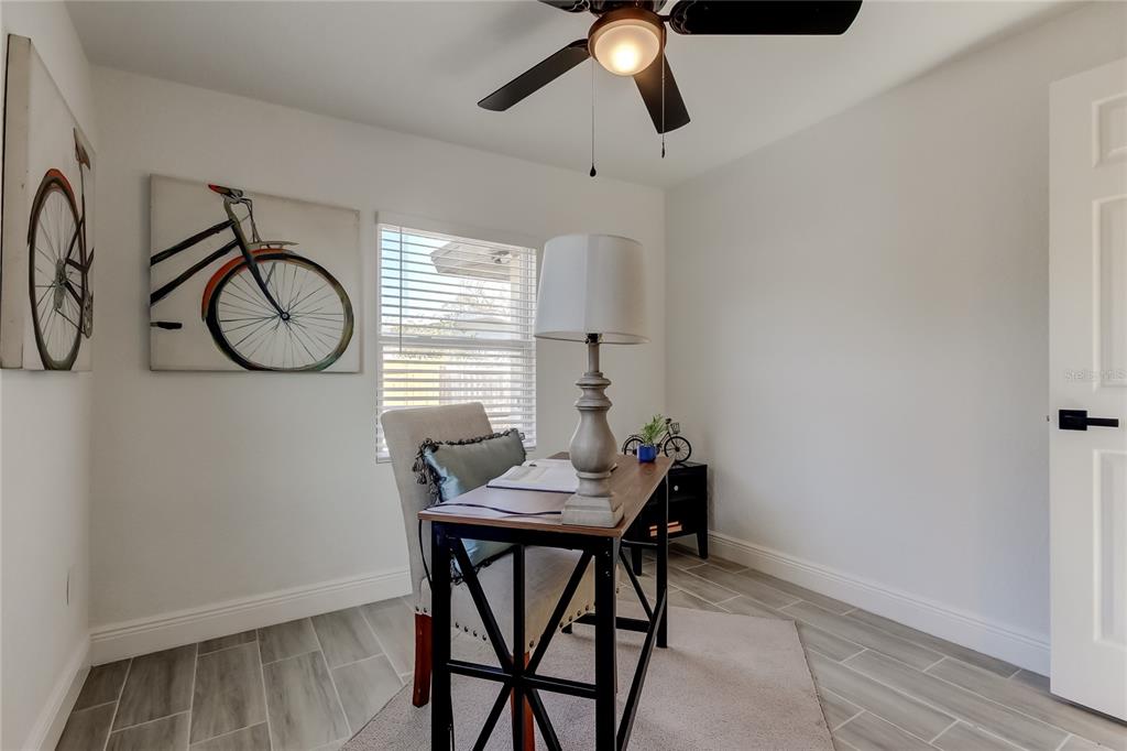 509 11th Street Northwest Largo, FL 33770 - Photo 31 of 36 a view of a room with furniture and window