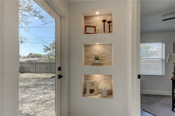a view of a door and a window