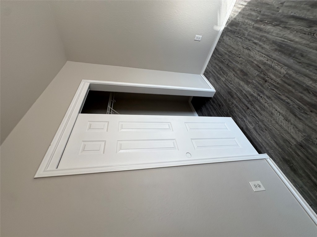 11510 Liberty Street Manor, TX 78653 - Photo 21 of 26 an empty room with wooden floor and closet