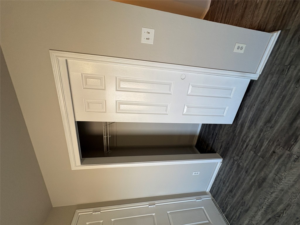 11510 Liberty Street Manor, TX 78653 - Photo 23 of 26 an empty room with wooden floor and closet