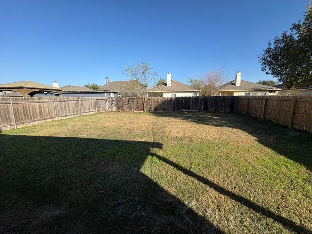 a view of swimming pool from a balcony